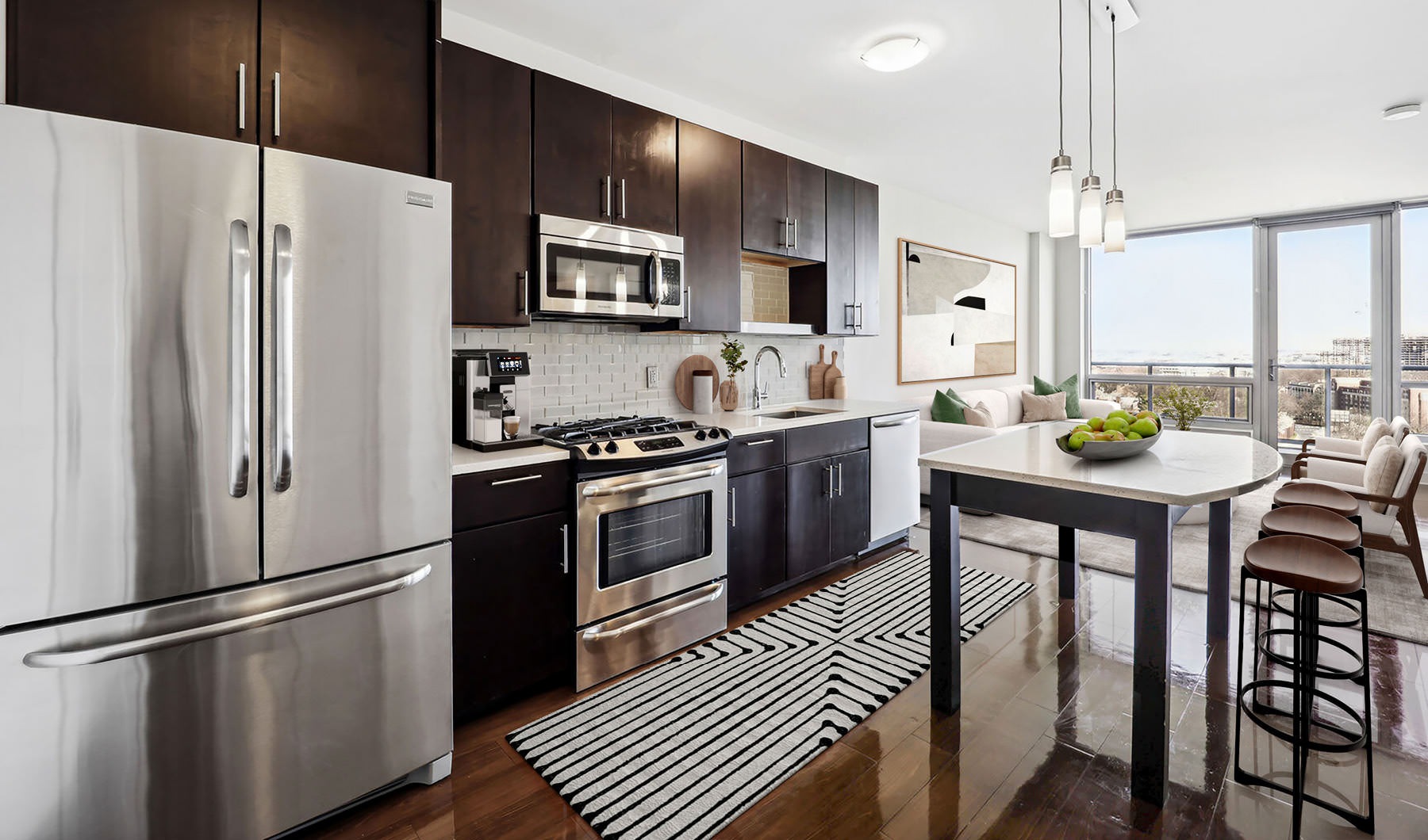 Prepare to Be Floored pendant lighting over kitchen island next to access to private balcony
