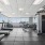 Modern City-View Gym with Treadmills, Free Weights & Fitness Equipment